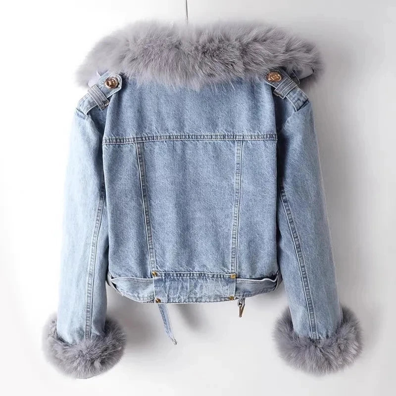 Stylish women's blue winter jacket, chic outerwear with faux trim, offering warmth and comfort.