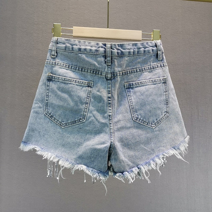 Comfortable blue women's shorts for everyday wear. Versatile summer apparel, ideal for casual warm weather outfits.
