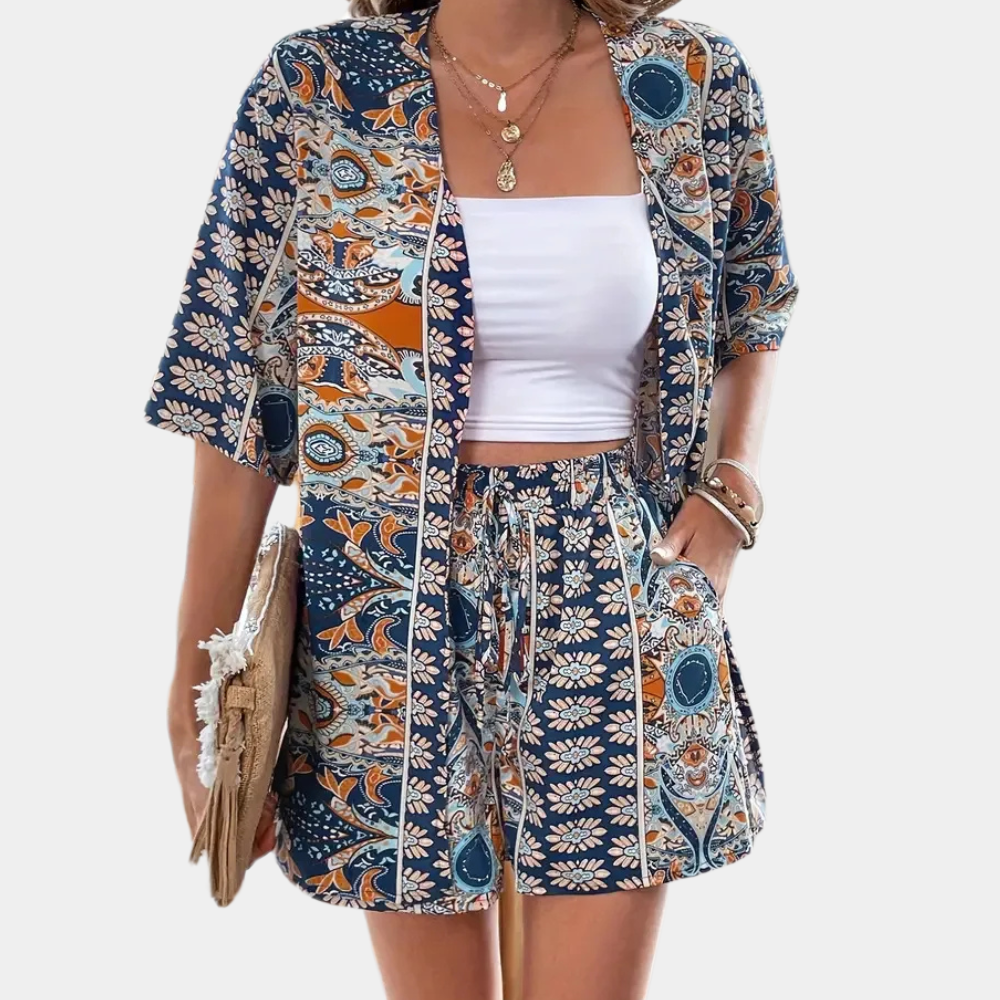Blue women's two-piece summer set, relaxed fit shorts & kimono-style top. Trendy casual lounge wear for women.