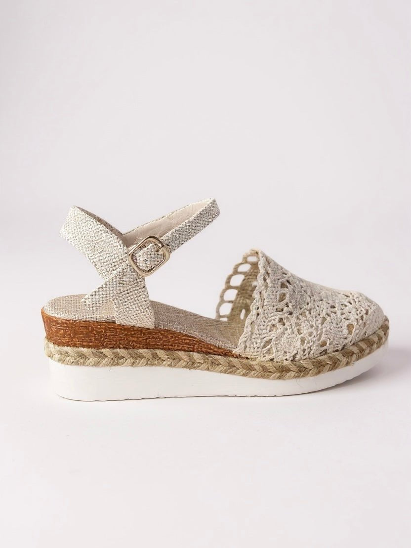 Warm weather women's espadrille platform sandals, bohemian casual style.