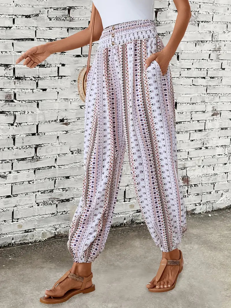 Women's smocked waist trousers with vibrant bohemian graphic print for casual wear