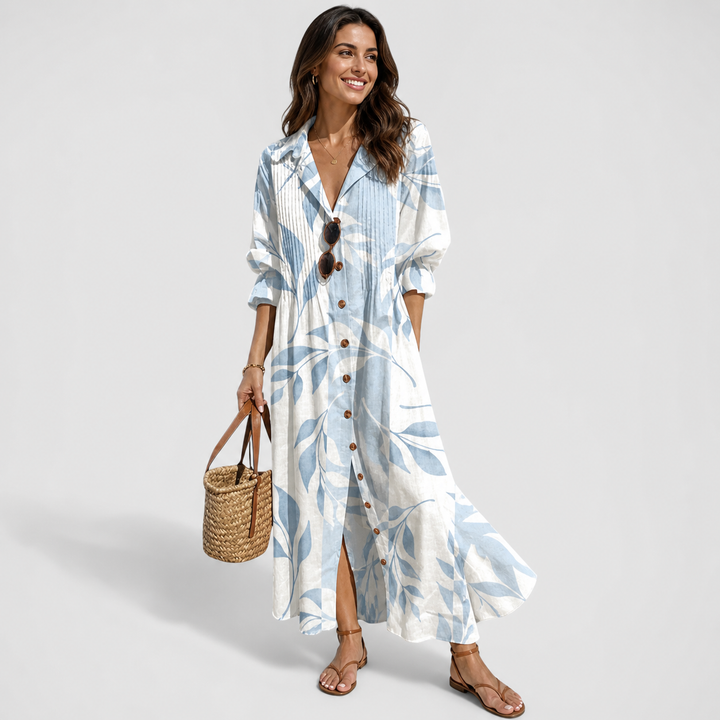 Bohemian printed maxi dress for women, with button-front, V-neck, and long sleeves. Flowy summer style.