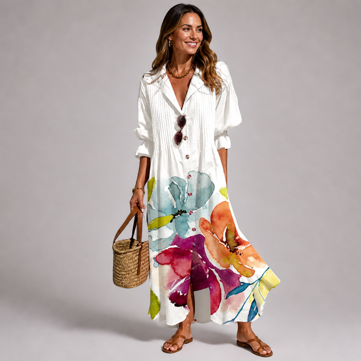 Chic women's long sleeve bohemian maxi dress with a stylish button-front design & all-over print. Vacation ready.