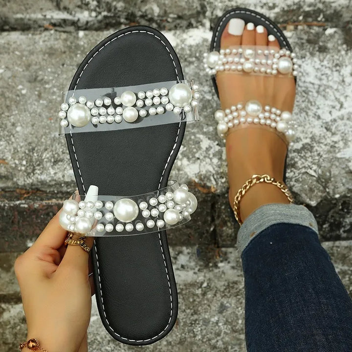 Bohemian women's flat sandals with beautiful pearl decor, perfect for beach and casual wear.