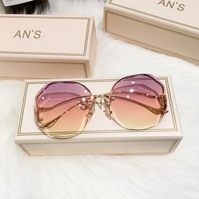 Close-up of women's boho ombre sunglasses featuring UV protection lenses and stylish frame