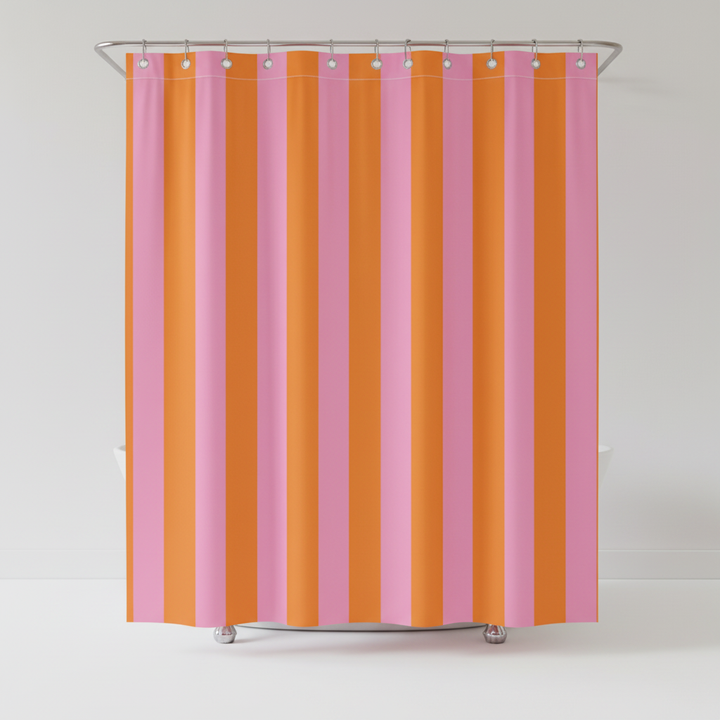 Stack of folded boho striped fabric shower curtains, highlighting the soft fabric and trendy modern bath stripes
