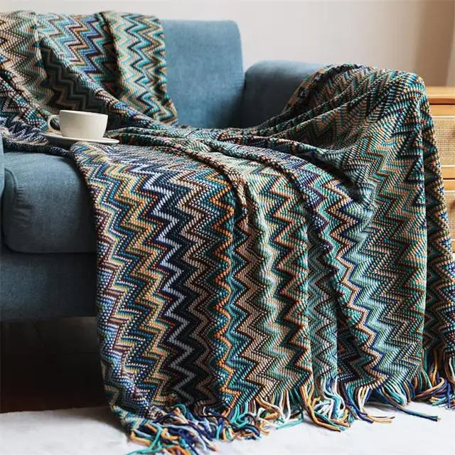 Boho striped throw with tassels, a soft and cozy accent perfect for your living room decor.