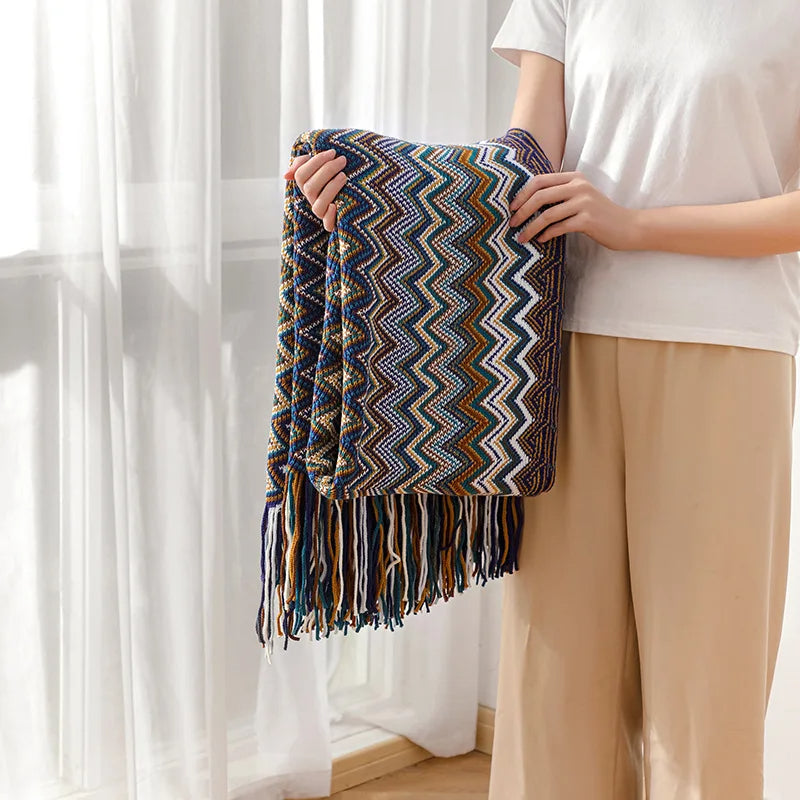 Accent your home with this cozy boho striped throw blanket & decorative, soft tassels.