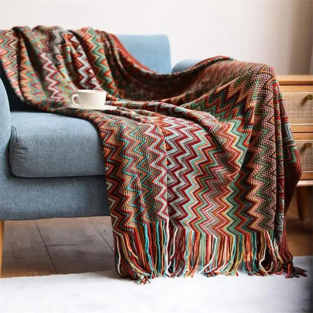 Bohemian striped throw blanket with tassels, soft and warm for ultimate cozy comfort.