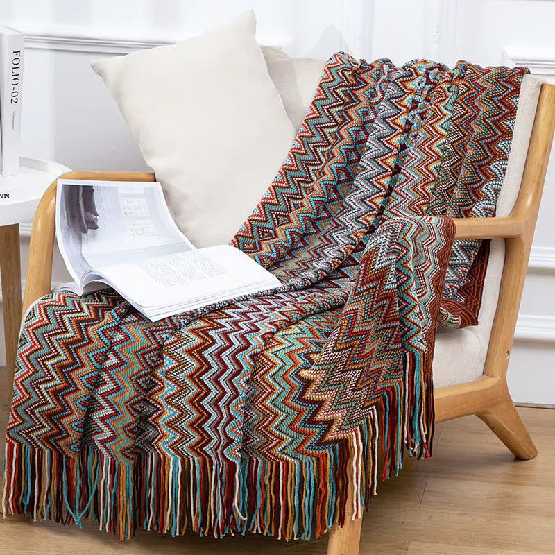 Comfortable striped boho throw blanket, soft and breathable with decorative tassels.