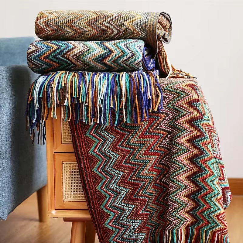 Chic striped throw blanket with tassels, boho style for a soft and cozy home accent.