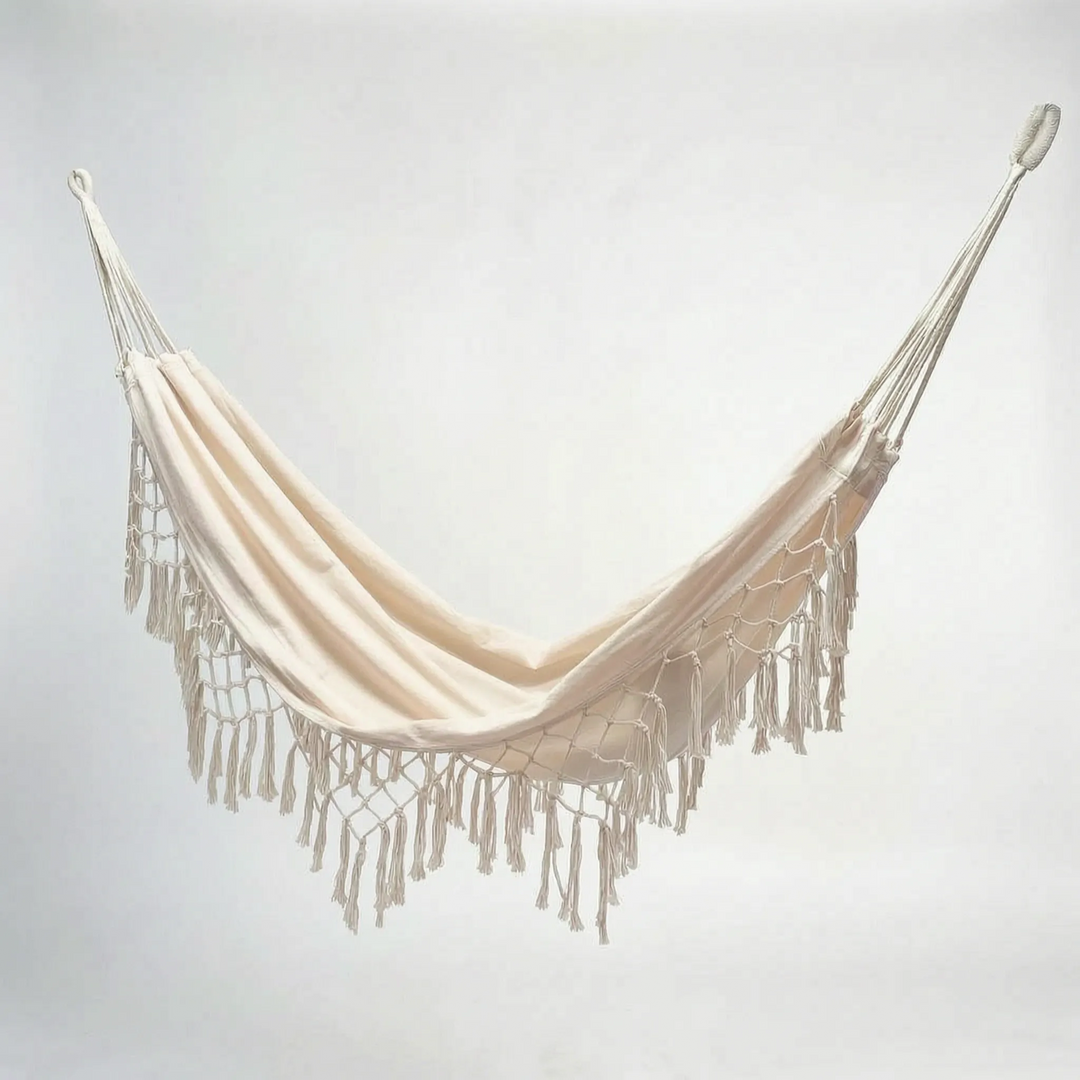 Relaxing boho tasseled outdoor hammock for your garden, made from durable cotton for ultimate outdoor comfort.