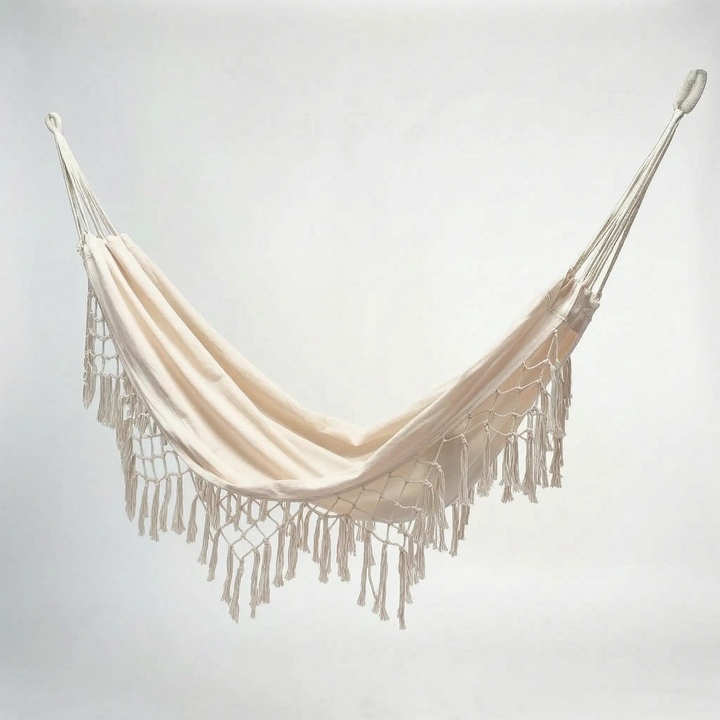 Relaxing boho tasseled outdoor hammock for your garden, made from durable cotton for ultimate outdoor comfort.