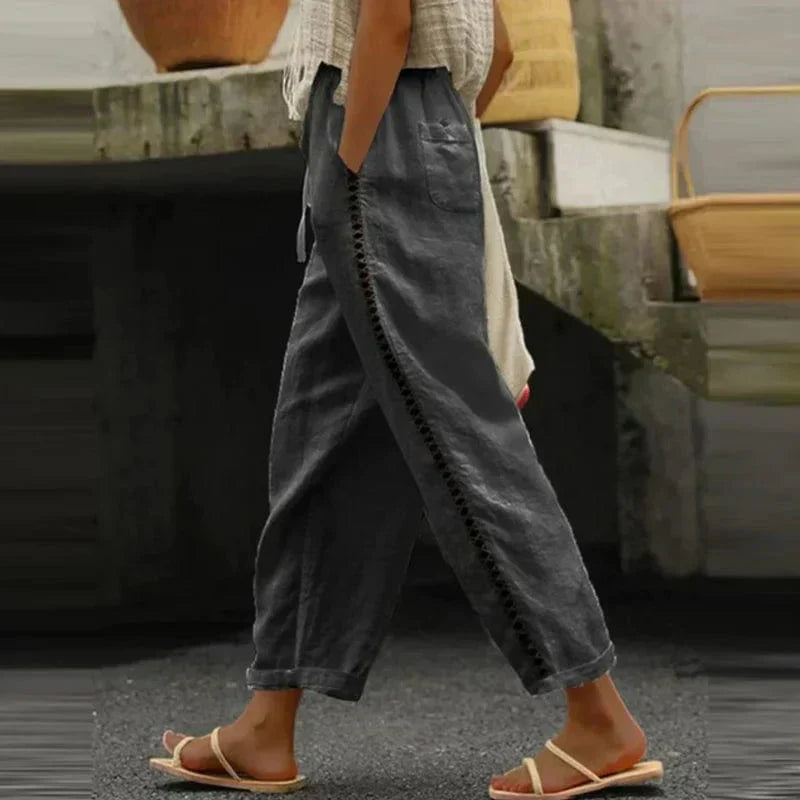 Casual women's boho print trousers, designed for summer comfort with a relaxed fit, suitable for beachwear.