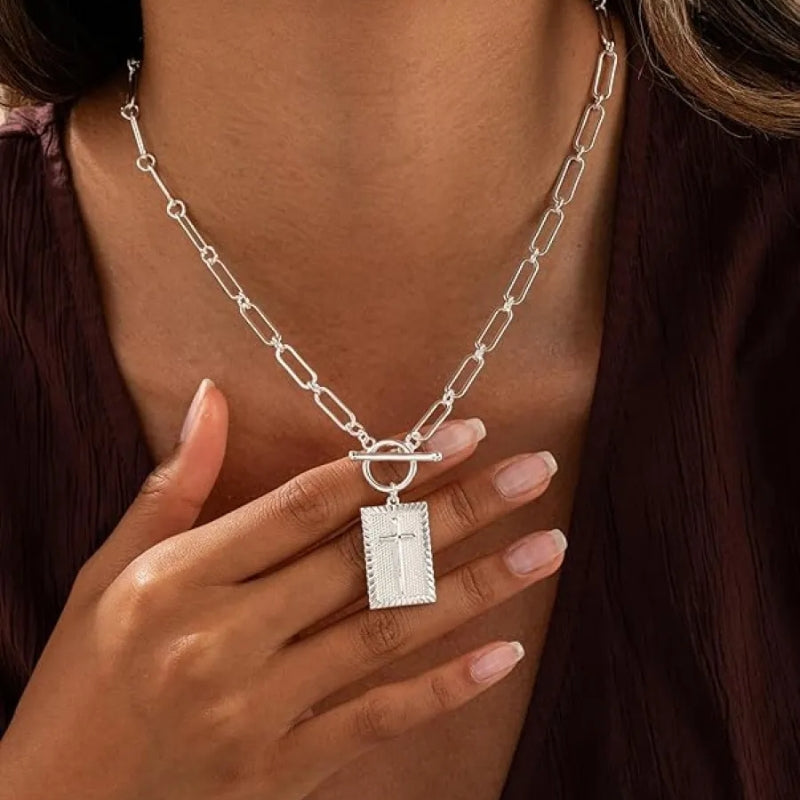 Unisex bold cross pendant necklace. Modern design with a strong chain, ideal for everyday style.