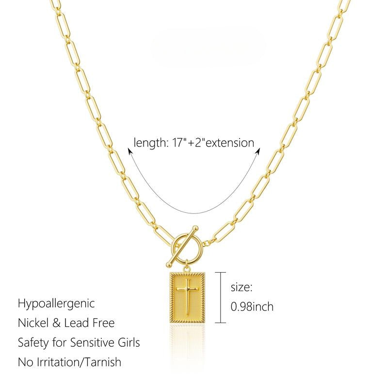 Trendy unisex cross pendant necklace. Bold gold-plated cross with a modern paperclip chain design.