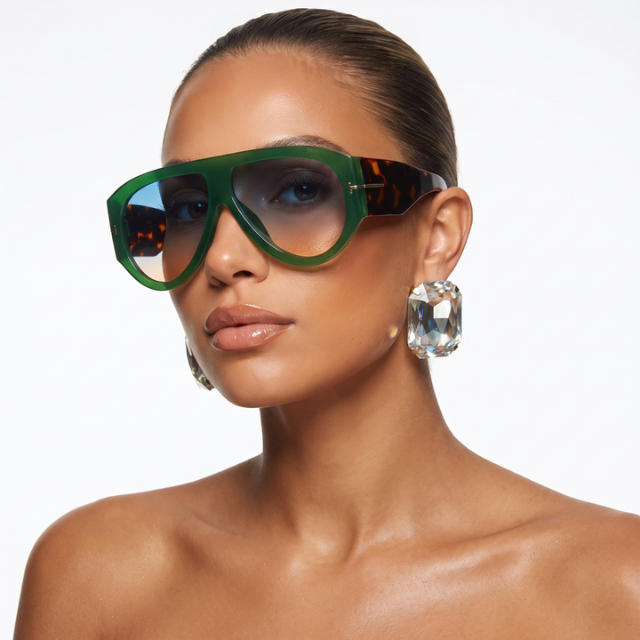 Bold oversized women's sunglasses with UV protection. Trendy fashion eyewear, color-blocked design.