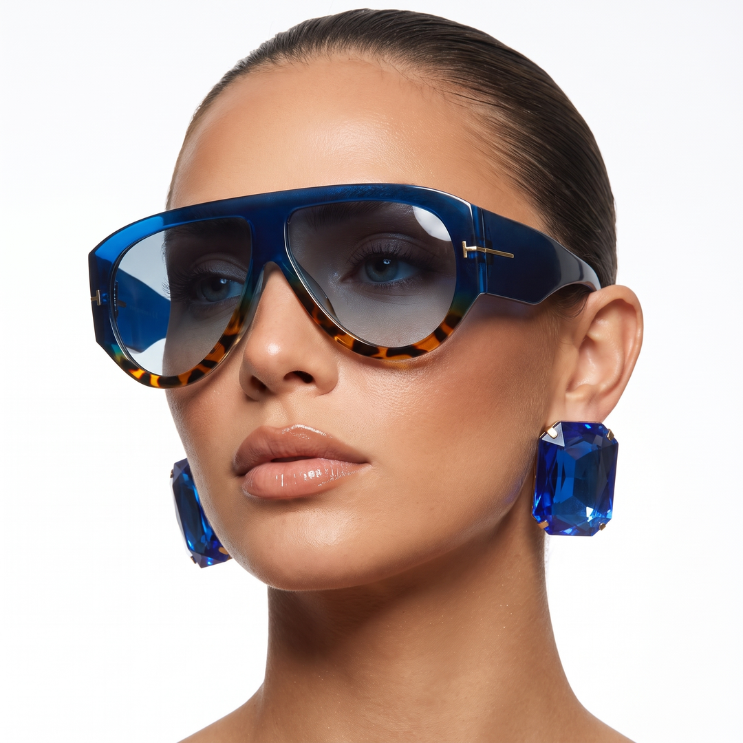 Women's UV protection oversized sunglasses, a bold statement accessory with gold detail.