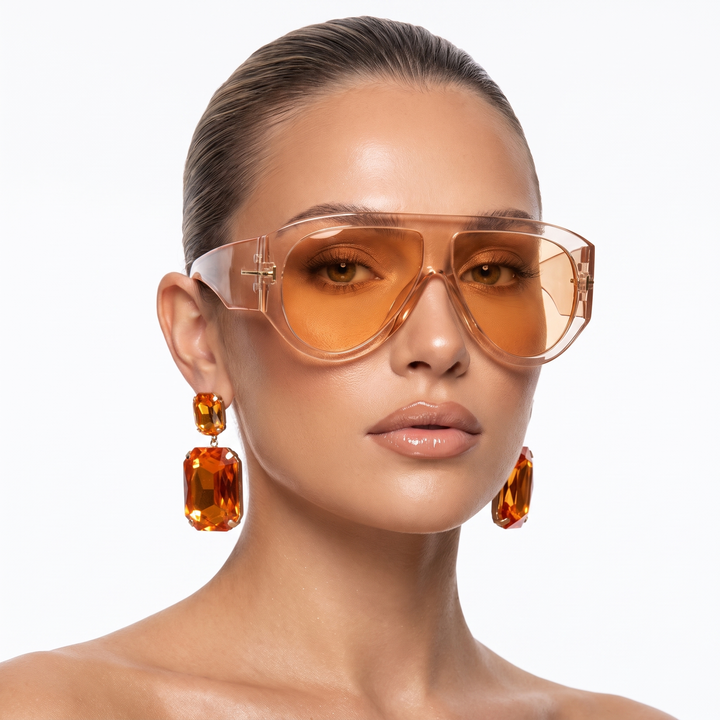 Trendy women's oversized sunglasses. Bold design, UV protection & gold detail. Perfect fashion eyewear.