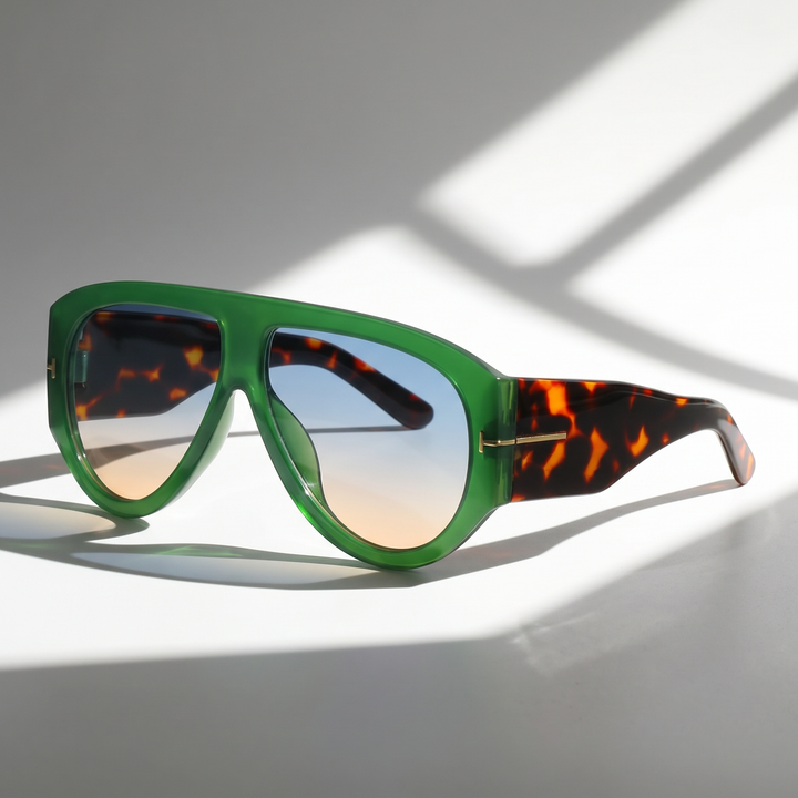 Women's bold oversized sunglasses with advanced UV protection. Stylish color-blocked fashion eyewear.