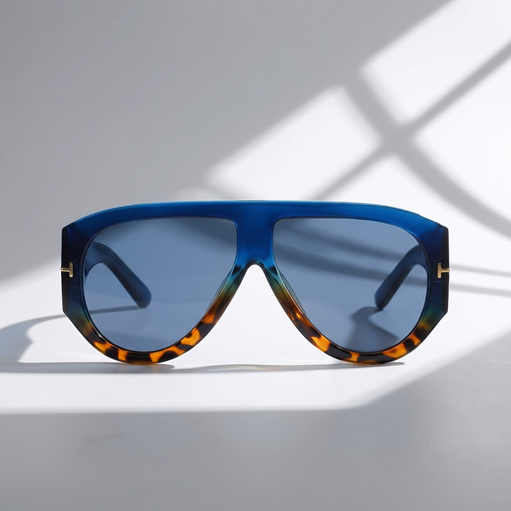 Statement women's oversized sunglasses. Trendy shades with UV protection, gold detail & eye protection.