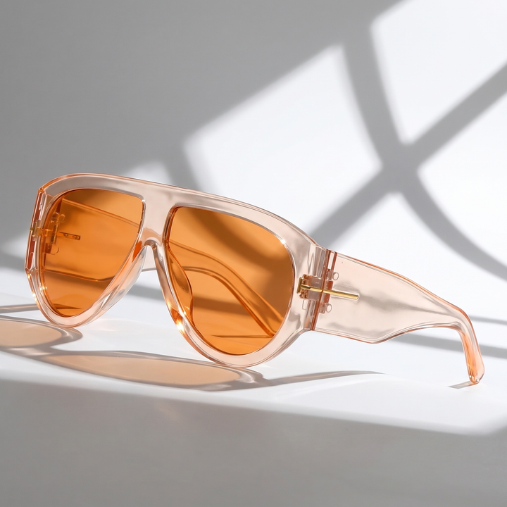Stylish women's oversized sunglasses for sun protection. Bold design, gold detail, and trendy eyewear.