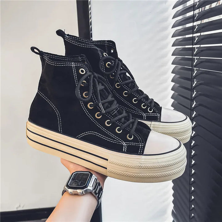 Modern unisex platform high top sneakers in a bold design, perfect for fashion and streetwear.