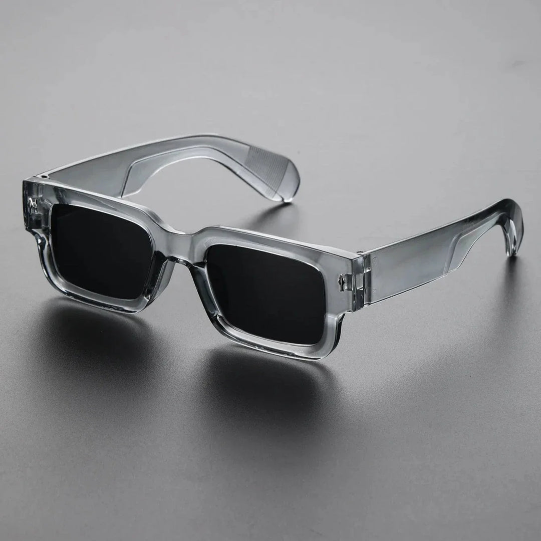 Bold unisex rectangular statement sunglasses with UV protection. Iconic fashion eyewear accessory for all.