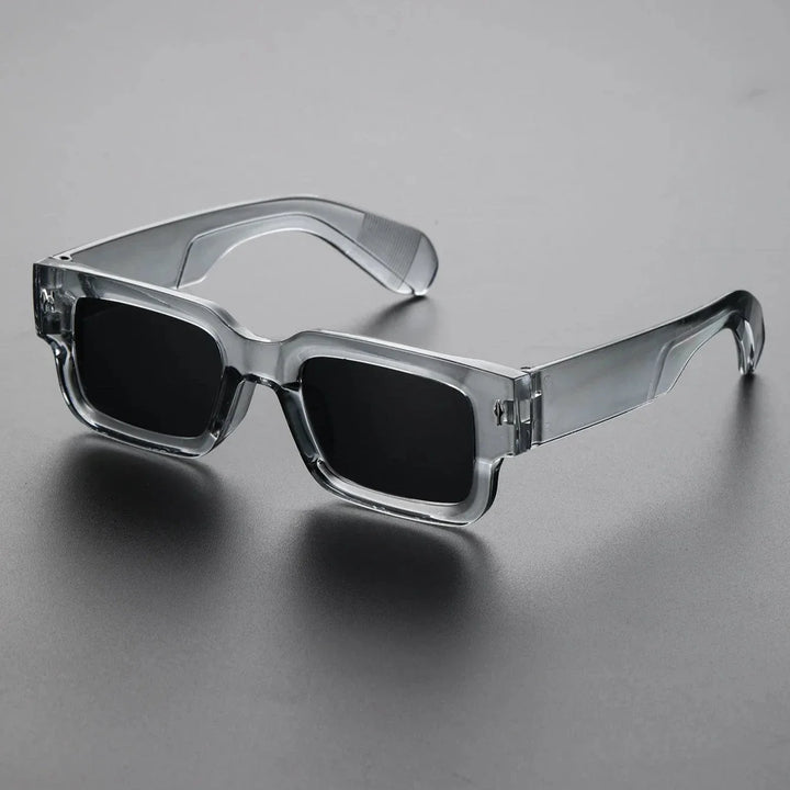 Bold unisex rectangular statement sunglasses with UV protection. Iconic fashion eyewear accessory for all.