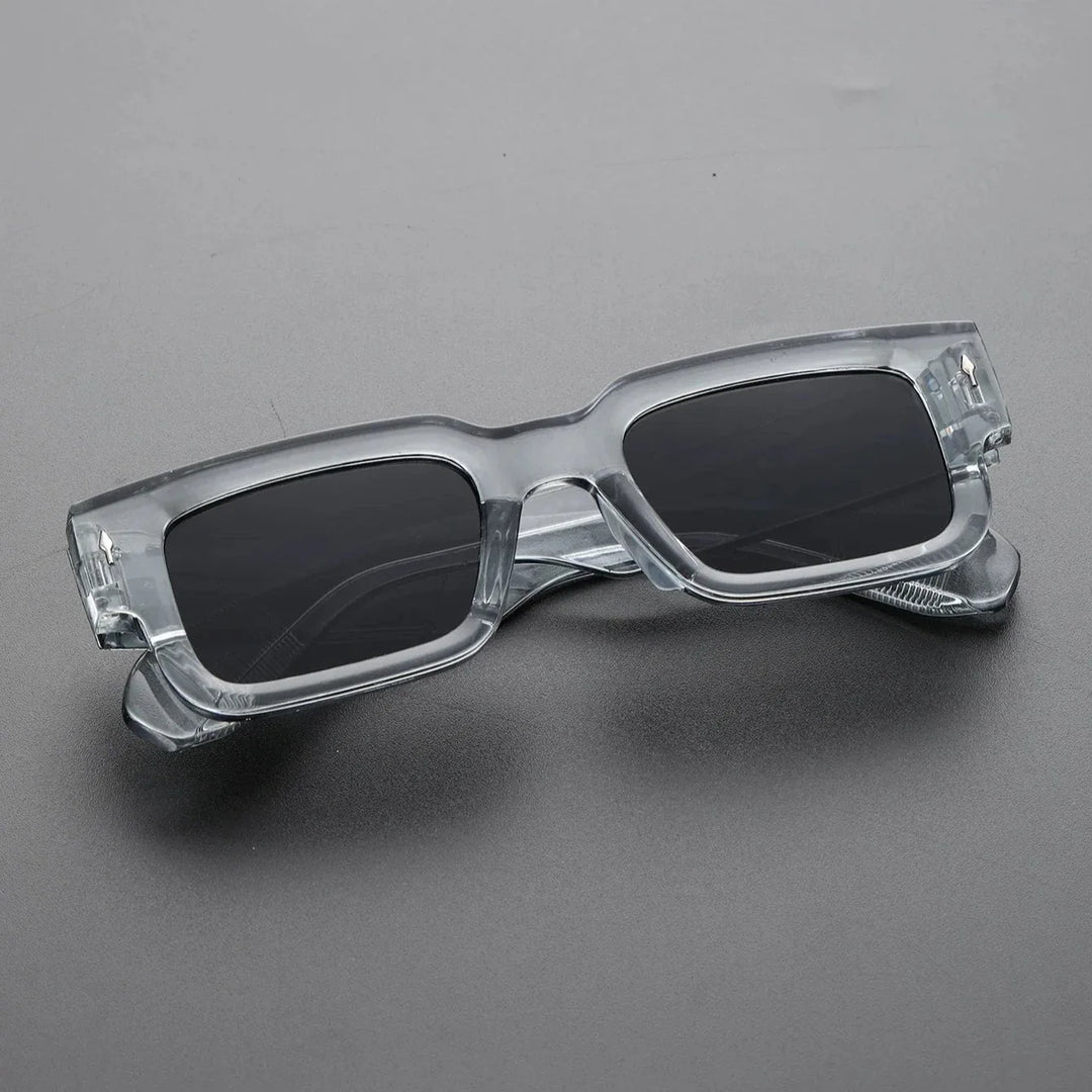 Iconic unisex shades. Bold rectangular sunglasses offering UV protection. A stylish fashion eyewear accessory.
