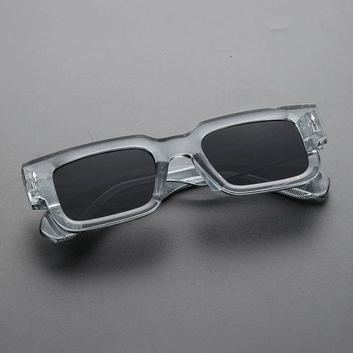 Iconic unisex shades. Bold rectangular sunglasses offering UV protection. A stylish fashion eyewear accessory.
