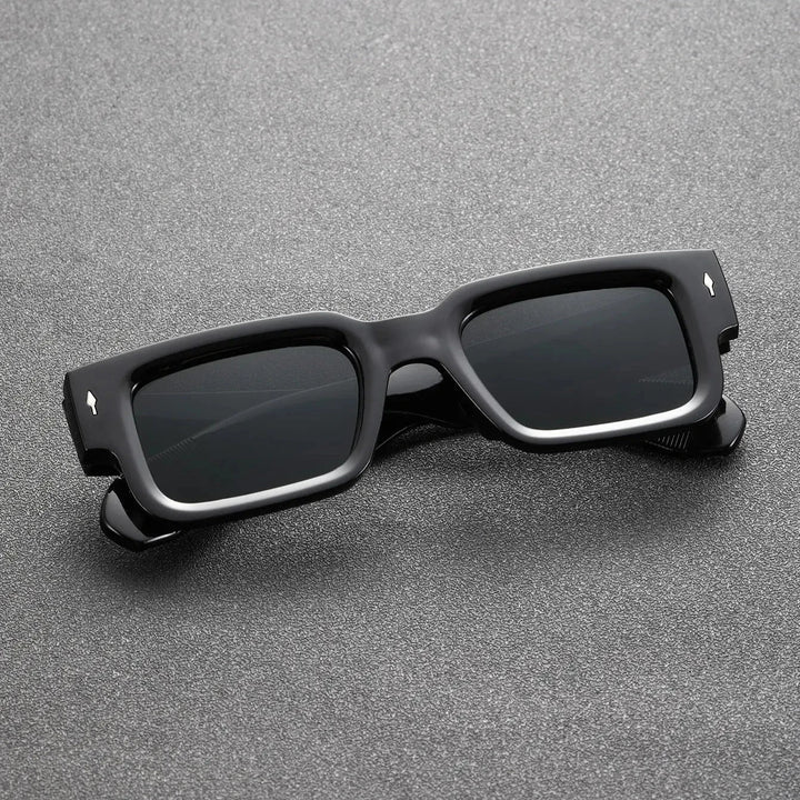 Unisex bold sunglasses providing UV protection. Rectangular statement shades, a must-have fashion eyewear accessory.