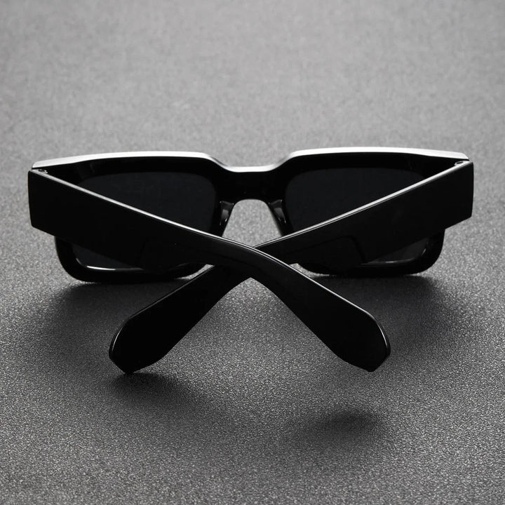 Bold iconic unisex rectangular sunglasses. Stylish statement eyewear accessory for fashion-conscious individuals.