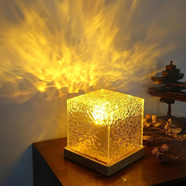 Stylish Borealis Cube USB lamp illuminating a modern living room with aurora borealis patterns