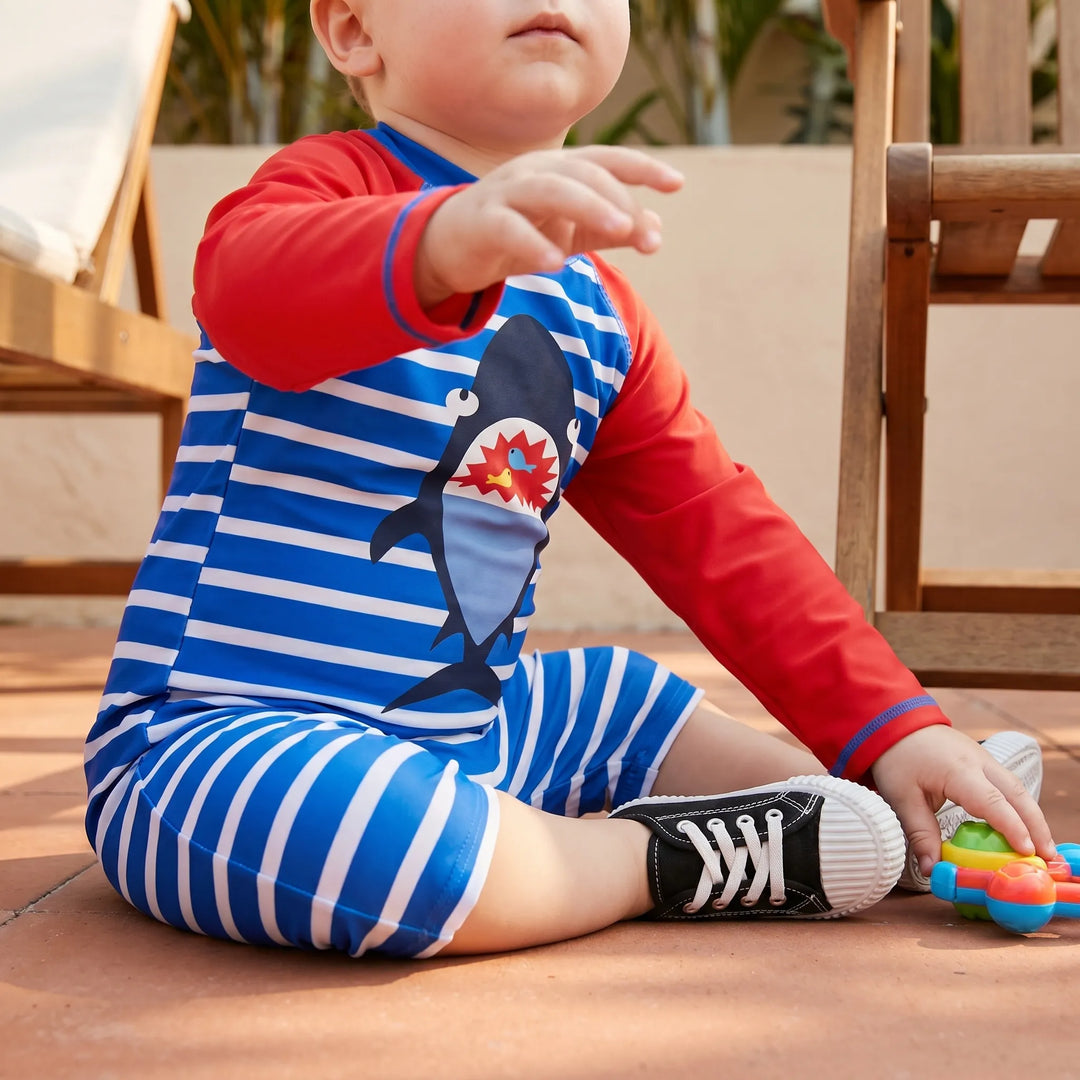 Boys' cartoon UPF 50+ swimwear set with matching hat. Perfect for toddler sun protection & beach play.