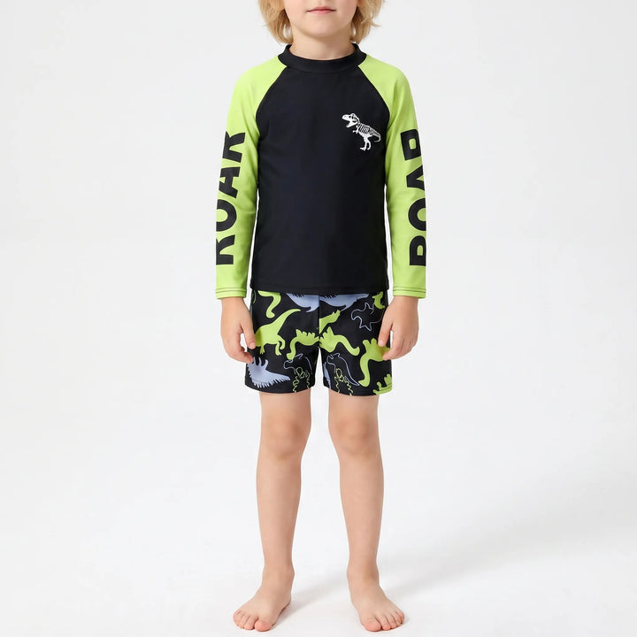Vibrant boys' dinosaur print rash guard swim set ensures UPF 50+ sun protection during summer water play.