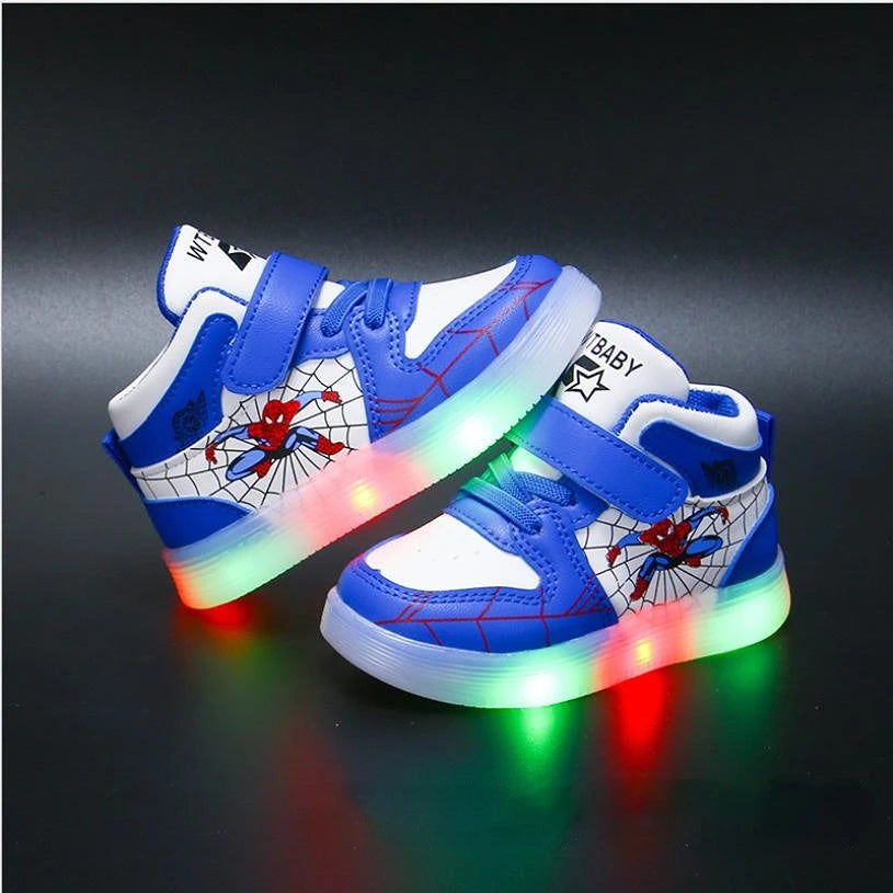Close-up of red, black, blue Spiderman light-up sneakers for boys. Kids' superhero athletic footwear for active play.