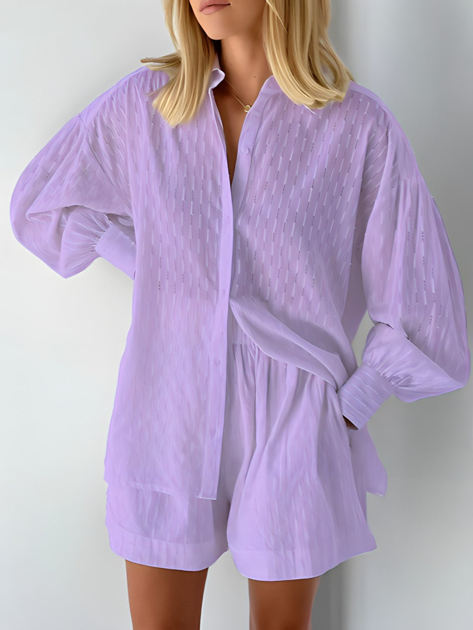 Women's perfect vacation loungewear: breezy two-piece summer set with comfy blouse & shorts.