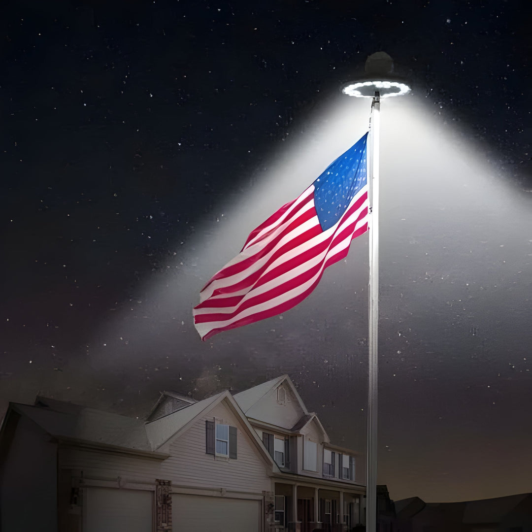 Automatic solar flagpole light with powerful LEDs. Weather-resistant, hassle-free outdoor flag illumination.