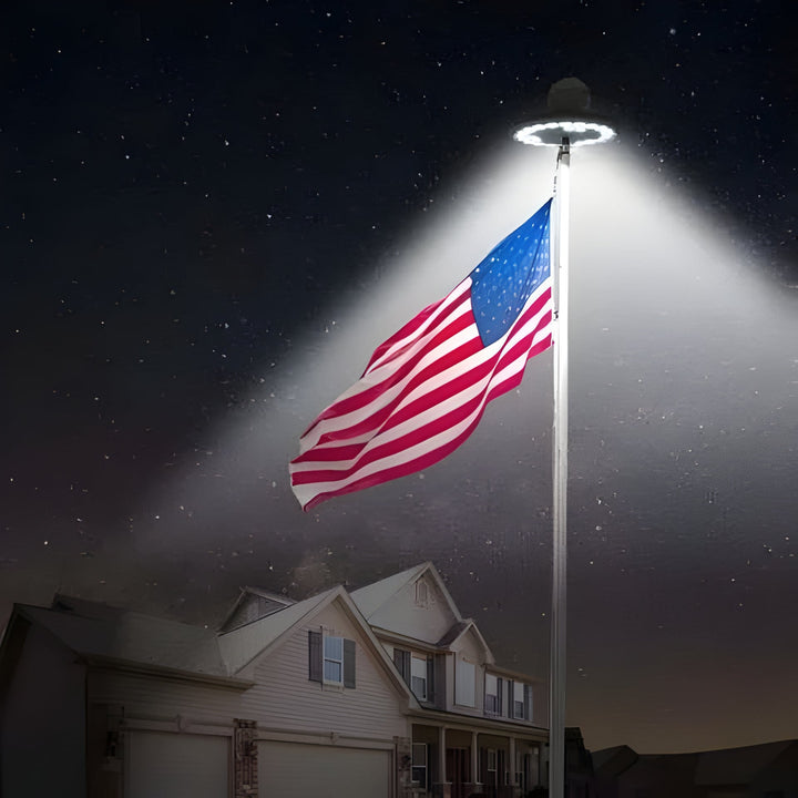 Automatic solar flagpole light with powerful LEDs. Weather-resistant, hassle-free outdoor flag illumination.