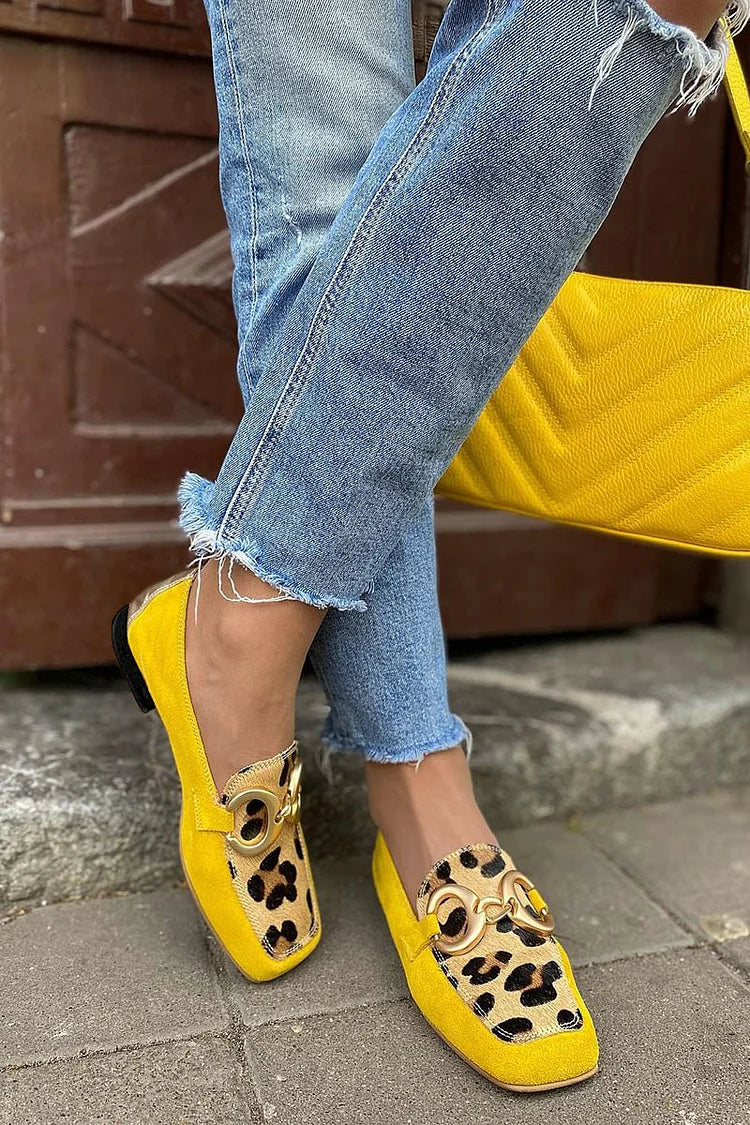 Stylish women's yellow penny toe loafers, slip-on comfort for spring summer fashion, elegant everyday footwear.