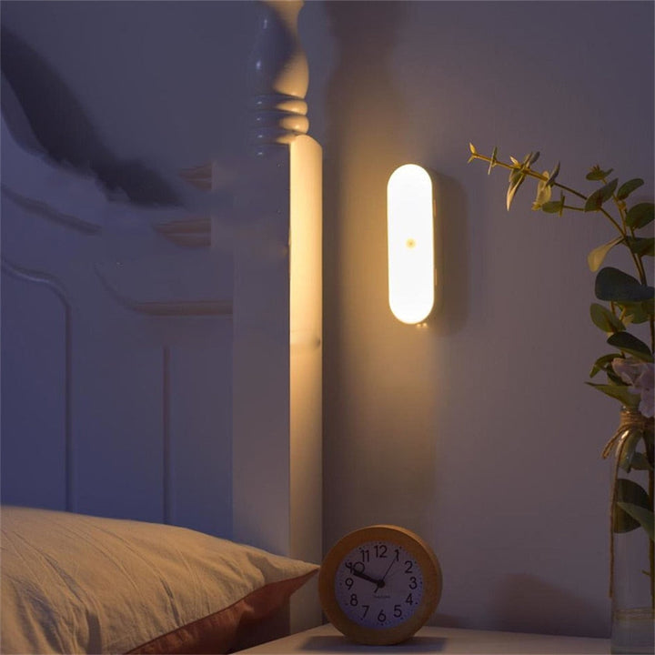 BrightSense USB rechargeable motion sensor LED wall light for wireless indoor lighting & home safety.