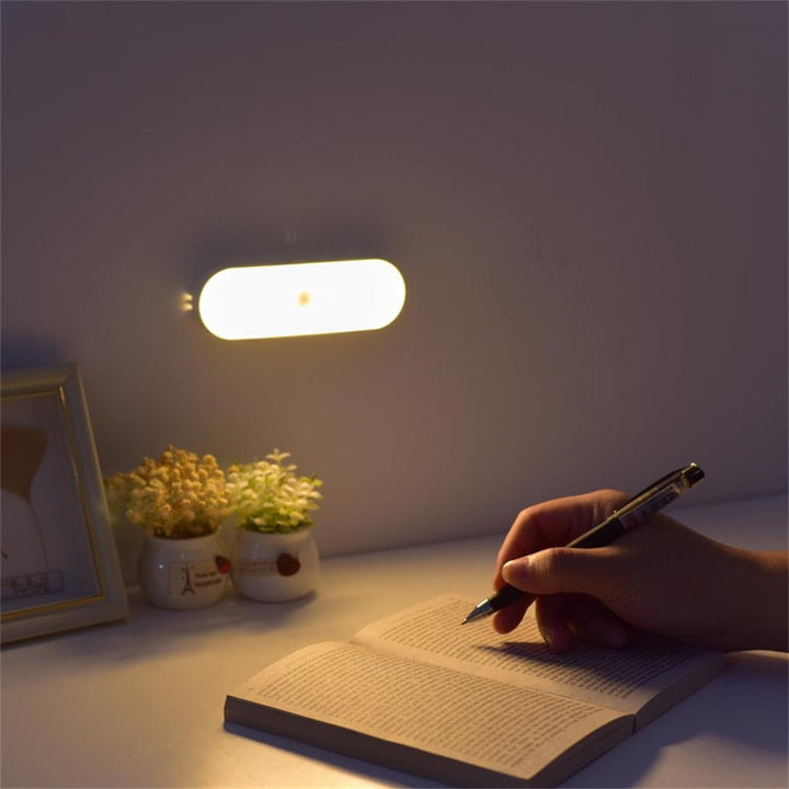 Energy-efficient LED motion sensor wall light, USB rechargeable for wireless home safety & convenience.