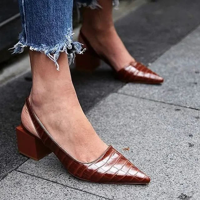 Brown croco print orthopaedic mid heels for women, comfortable slingback pumps ideal for formal wear.
