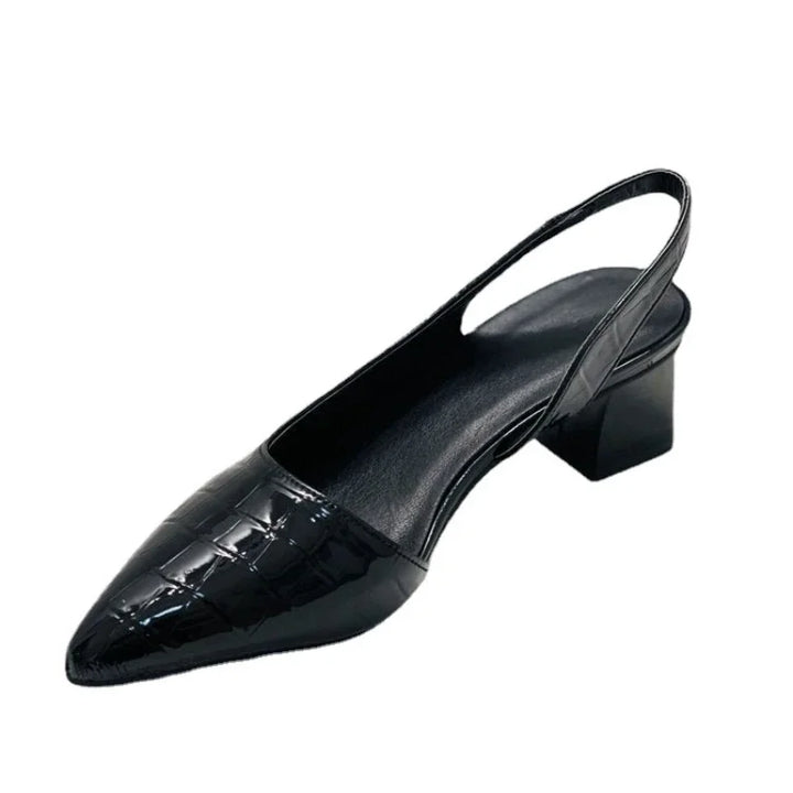 Formal women's orthopaedic mid heels in black croco print, providing comfort and style as versatile pumps.