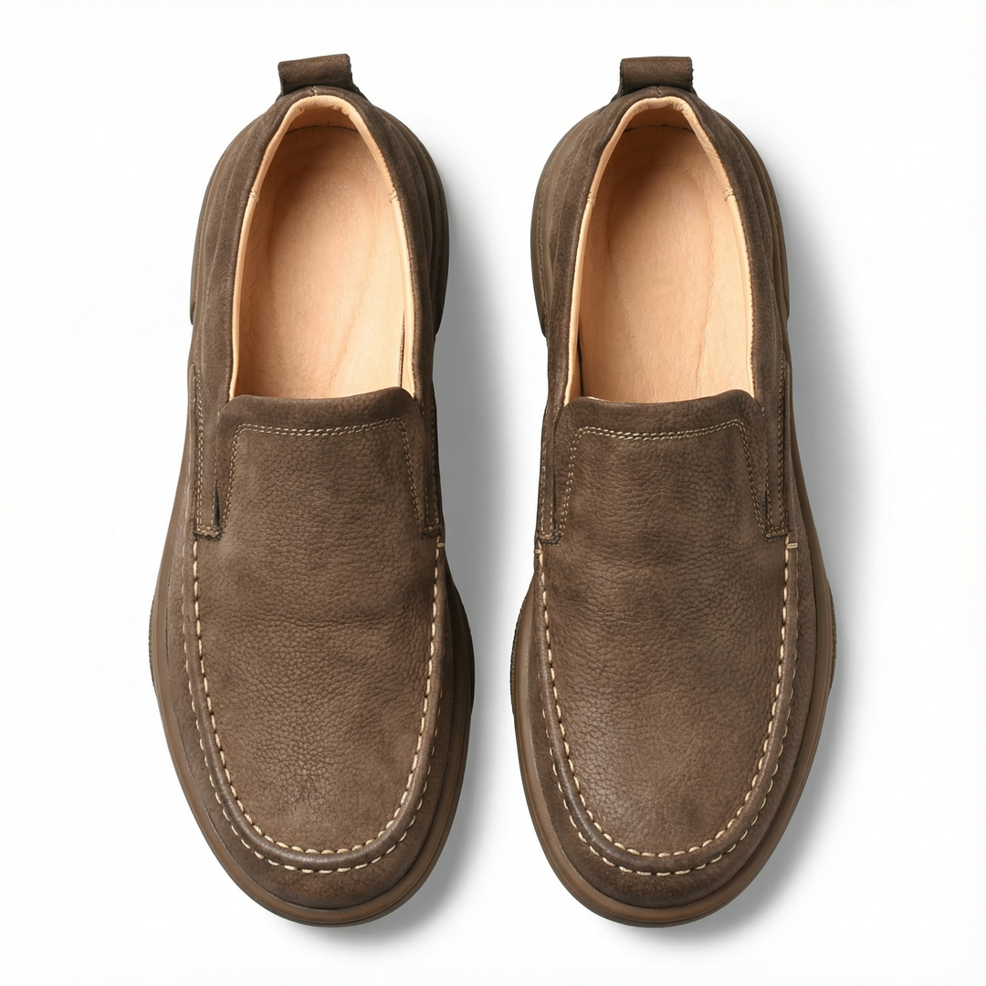 Men's casual brown comfort loafers. Slip-on everyday footwear, combining classic style with durable design.