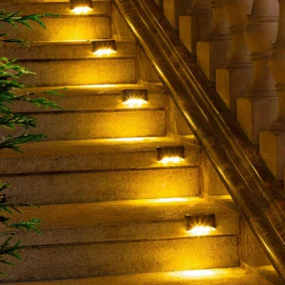 Brown waterproof solar garden light for pathways & patios. Energy-efficient outdoor lighting.