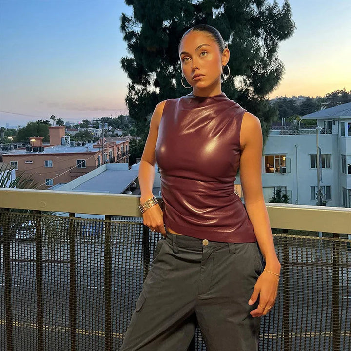 Fashionable women's sleeveless top in burgundy, ideal for winter style
