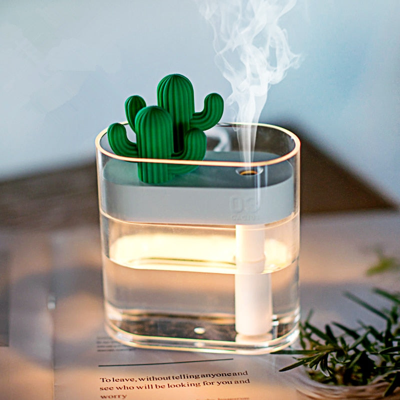 Portable USB-powered ultrasonic humidifier with cute cactus design. Quiet mist for healthy air & wellness.