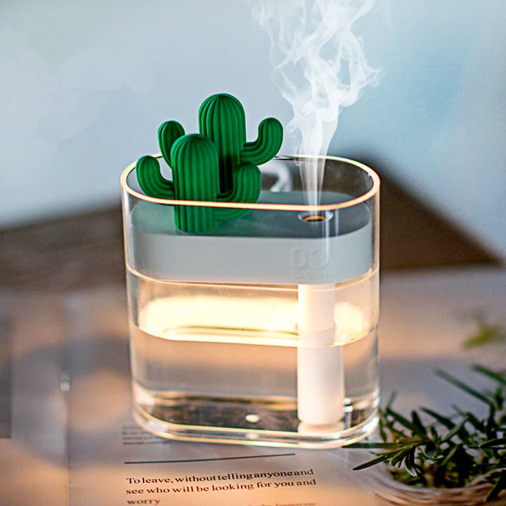 Portable USB-powered ultrasonic humidifier with cute cactus design. Quiet mist for healthy air & wellness.